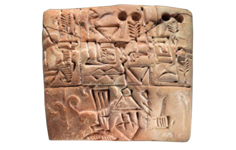 escritura cuneiforme sobre arcilla